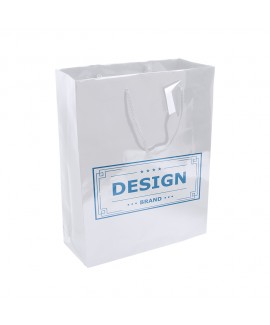 Shopper con soffietto in carta laminata 157 g/m2 con rinforzo alla base, maniglie in cordino e biglietto auguri