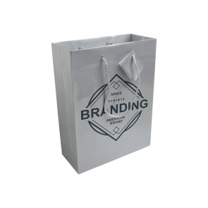 Shopper con soffietto in carta laminata 157 g/m2 con rinforzo alla base, maniglie in cordino e biglietto personalizzato promozionale-27
